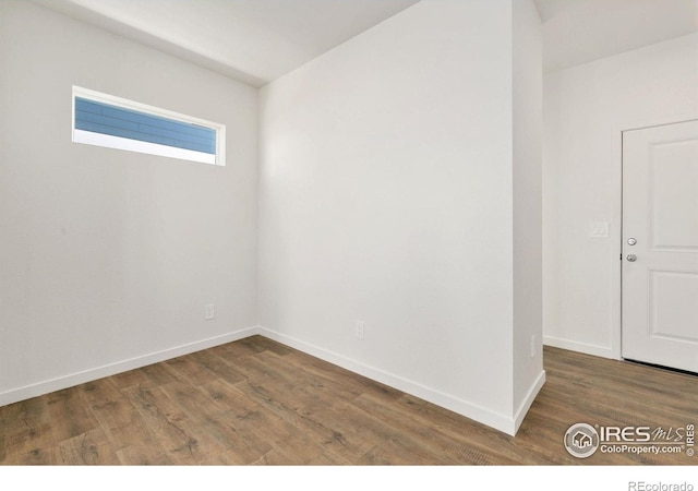 3178 Buffalo Grass Ln, Wellington, CO 80549 - empty room with wood finished floors