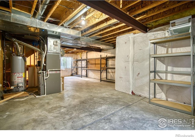 2408 Eagleview Cir, Longmont, CO 80504 - below grade area featuring gas water heater and heating unit
