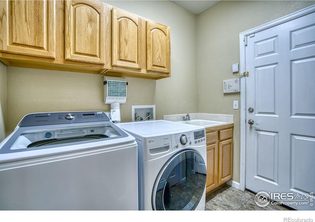 2408 Eagleview Cir, Longmont, CO 80504 - laundry area featuring independent washer and dryer and cabinet space