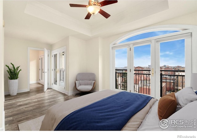 1827 N Grant St Unit 604, Denver, CO 80203 - bedroom with a tray ceiling, access to outside, wood finished floors, french doors, and ornamental molding