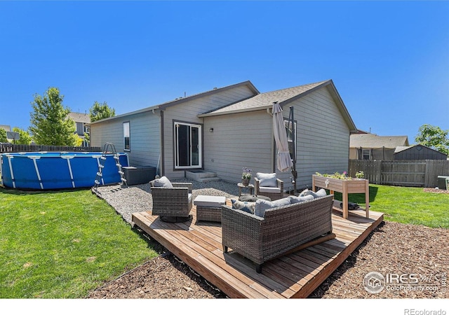 2065 Wildwood St, Lochbuie, CO 80603 - back of house with a wooden deck and an outdoor hangout area
