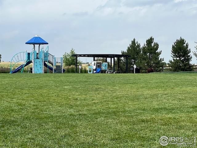 2065 Wildwood St, Lochbuie, CO 80603 - community jungle gym with a lawn