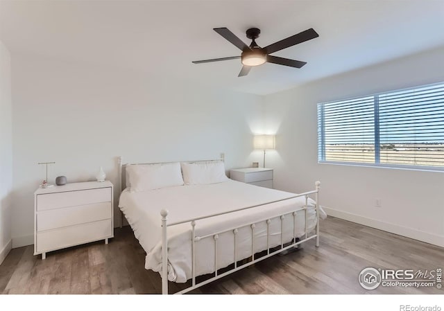 6645 Dry Fork Dr, Frederick, CO 80516 - bedroom featuring wood finished floors and ceiling fan