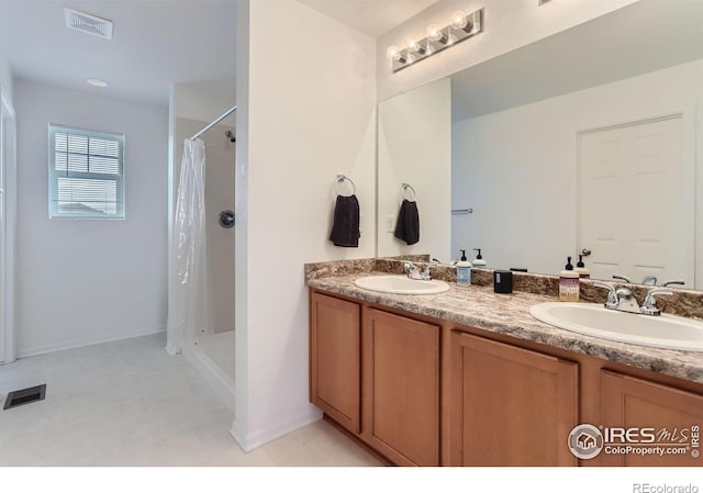 6645 Dry Fork Dr, Frederick, CO 80516 - full bath featuring double vanity and a shower with curtain