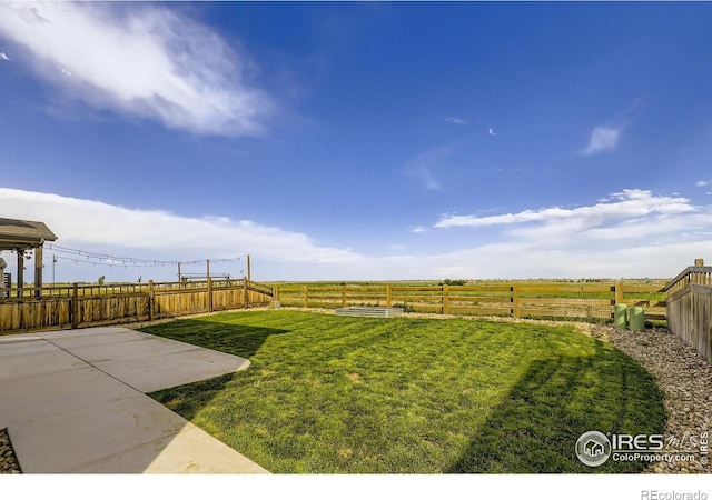 6645 Dry Fork Dr, Frederick, CO 80516 - fenced backyard featuring a patio area
