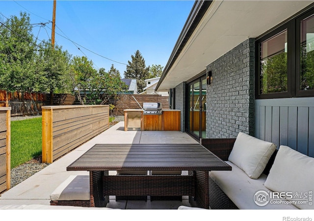 3275 19th St, Boulder, CO 80304 - fenced backyard with french doors, outdoor dining space, area for grilling, and a patio