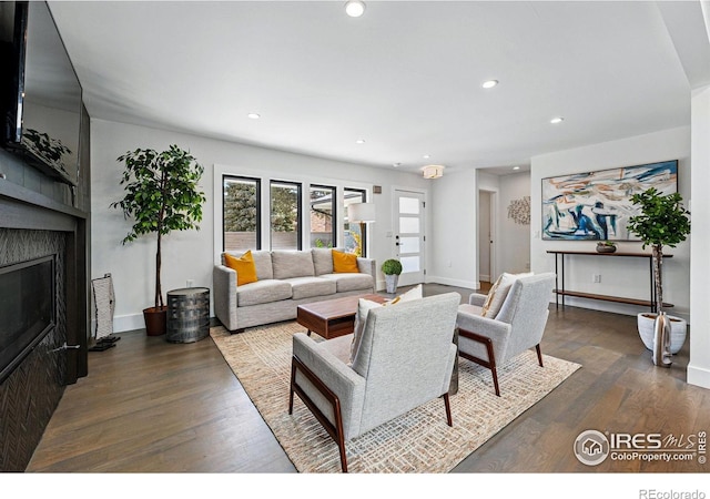 3275 19th St, Boulder, CO 80304 - living area featuring a large fireplace, recessed lighting, and wood finished floors