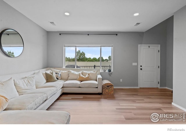3644 Ronald Reagan Ave, Wellington, CO 80549 - living room featuring recessed lighting and light wood finished floors