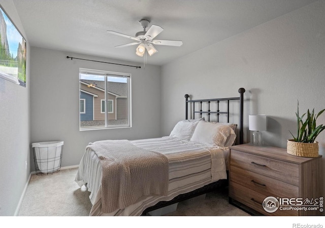 3644 Ronald Reagan Ave, Wellington, CO 80549 - carpeted bedroom featuring baseboards and ceiling fan