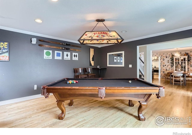 1405 Clover Creek Dr, Longmont, CO 80503 - recreation room with crown molding, billiards, wood finished floors, and recessed lighting