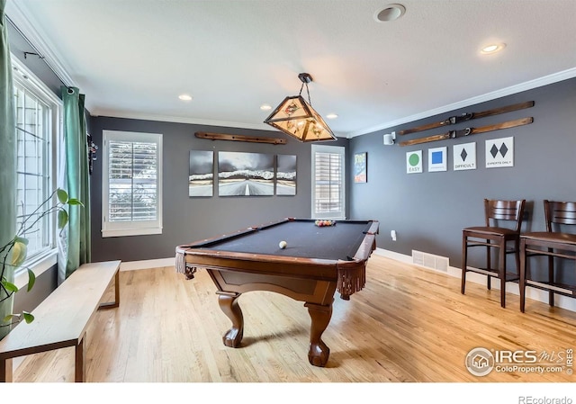 1405 Clover Creek Dr, Longmont, CO 80503 - recreation room with crown molding, billiards, wood finished floors, and recessed lighting