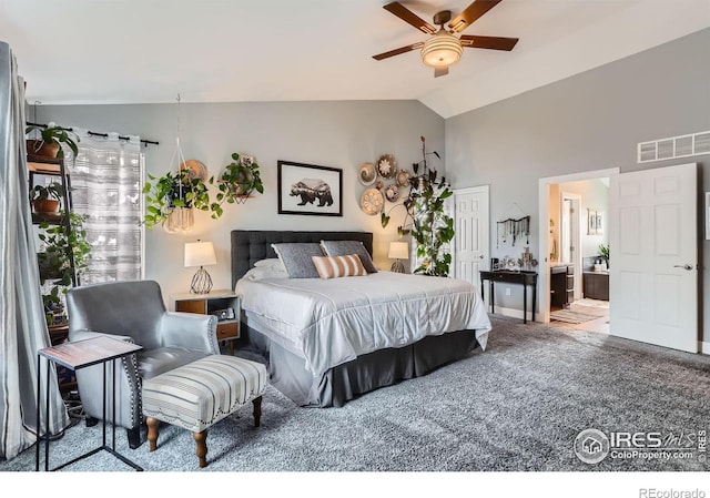 1405 Clover Creek Dr, Longmont, CO 80503 - carpeted bedroom with vaulted ceiling, ensuite bathroom, and ceiling fan