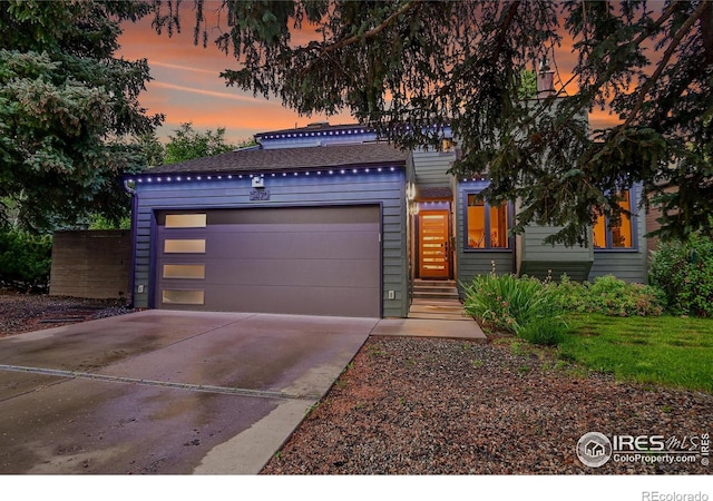 3470 16th St, Boulder, CO 80304 - view of front facade with an attached garage and driveway