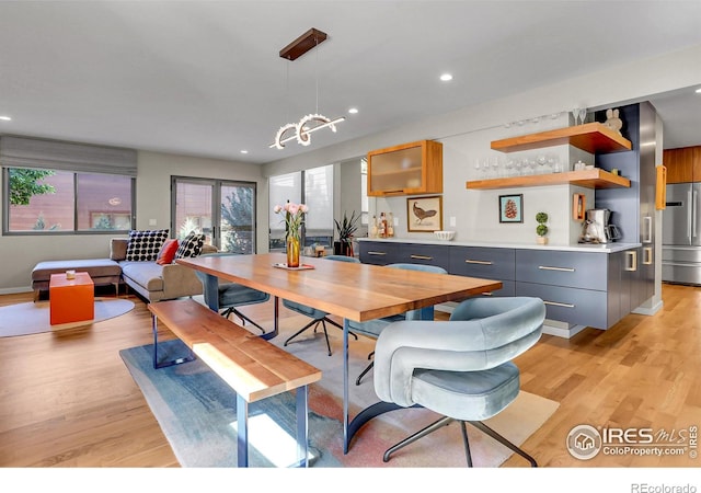 3470 16th St, Boulder, CO 80304 - dining area with light wood-style flooring, recessed lighting, and a chandelier