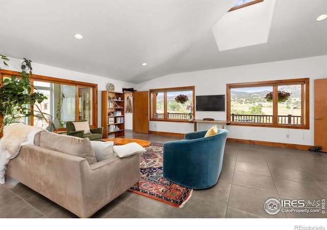 108 Lonestar Rd, Lyons, CO 80540 - living area with lofted ceiling, recessed lighting, a skylight, and tile patterned flooring