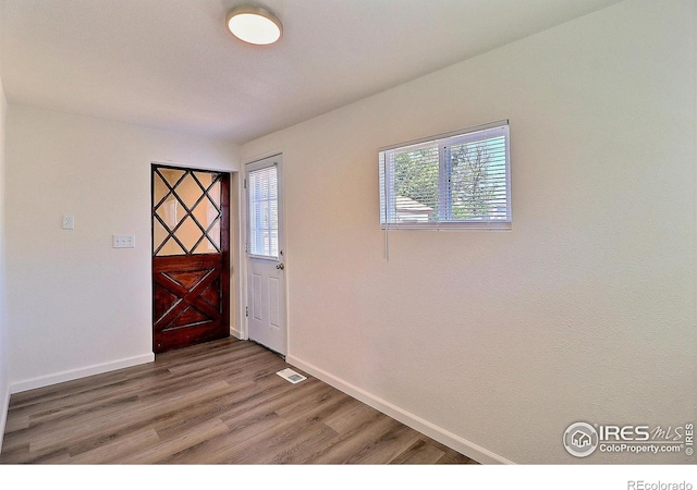 263 E 2nd St, Ault, CO 80610 - foyer featuring baseboards and light wood-type flooring
