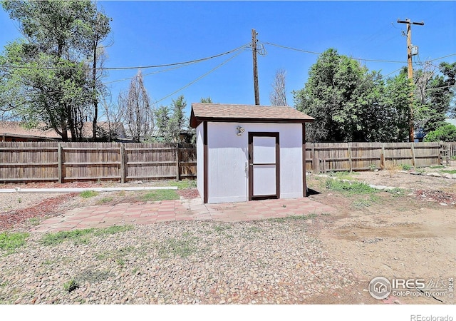 263 E 2nd St, Ault, CO 80610 - view of shed with a fenced backyard