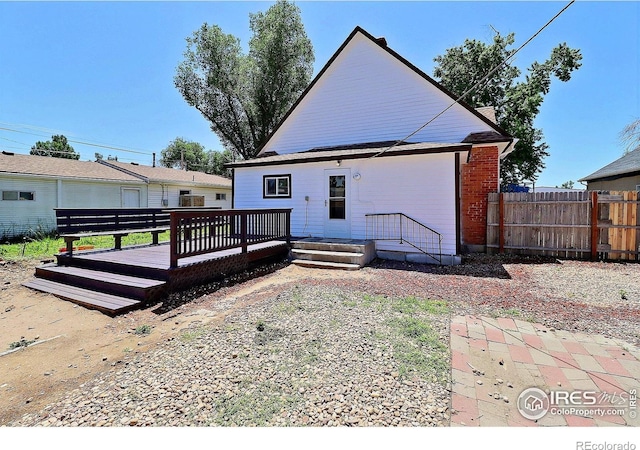 263 E 2nd St, Ault, CO 80610 - rear view of house with a deck