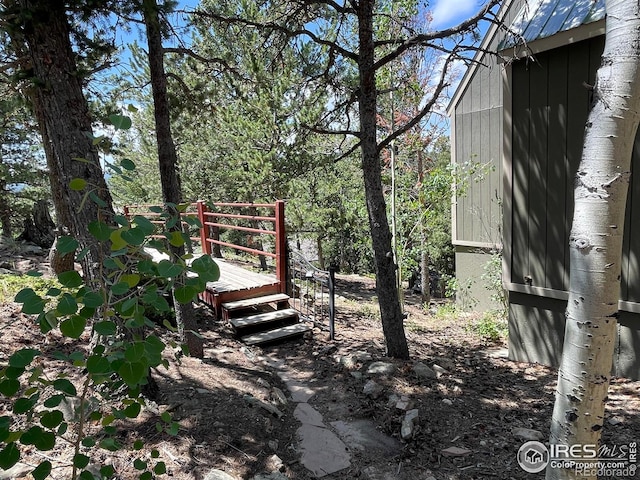 383 Evergreen Rd, Black Hawk, CO 80422 - view of yard featuring a deck