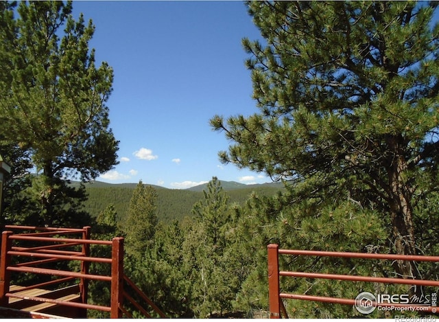 383 Evergreen Rd, Black Hawk, CO 80422 - view of mountain backdrop with a forest