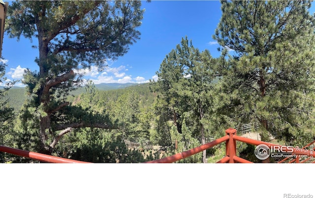 383 Evergreen Rd, Black Hawk, CO 80422 - view of mountain backdrop with a heavily wooded area