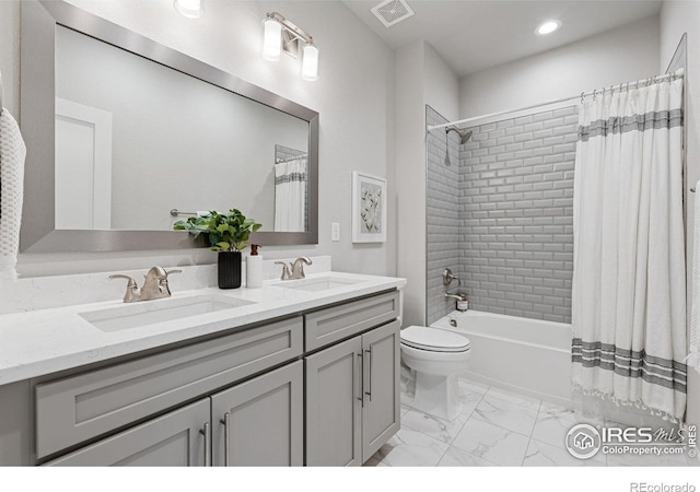 3315 Heron Lakes Pkwy, Berthoud, CO 80513 - full bath featuring double vanity, shower / tub combo, marble look tile flooring, and recessed lighting