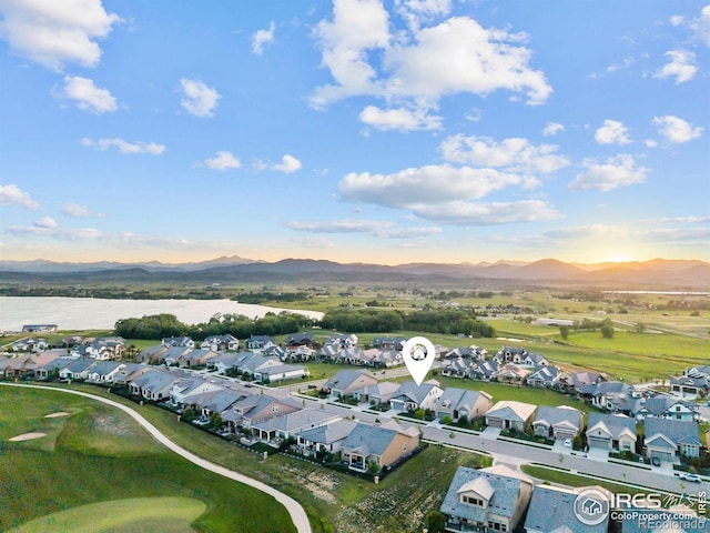3315 Heron Lakes Pkwy, Berthoud, CO 80513 - aerial view of residential area with a mountain backdrop