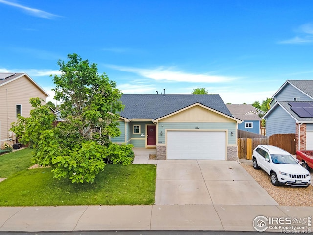 1384 S Growers Dr, Milliken, CO 80543 - single story home featuring a garage, concrete driveway, and roof with shingles