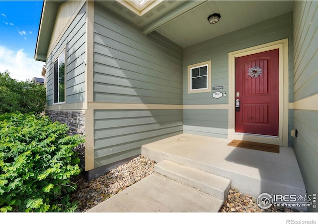 1384 S Growers Dr, Milliken, CO 80543 - entrance to property with stone siding