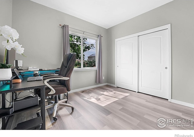 1384 S Growers Dr, Milliken, CO 80543 - home office featuring light wood-style flooring and baseboards