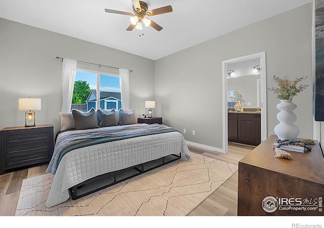 1384 S Growers Dr, Milliken, CO 80543 - bedroom featuring light wood finished floors, ensuite bathroom, and a ceiling fan