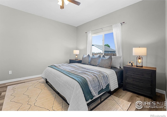 1384 S Growers Dr, Milliken, CO 80543 - bedroom featuring wood finished floors and ceiling fan
