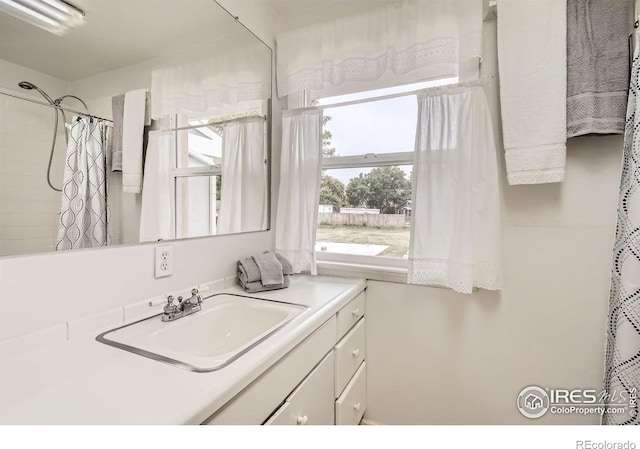 4331 Page Pl, Loveland, CO 80537 - full bath featuring vanity and curtained shower