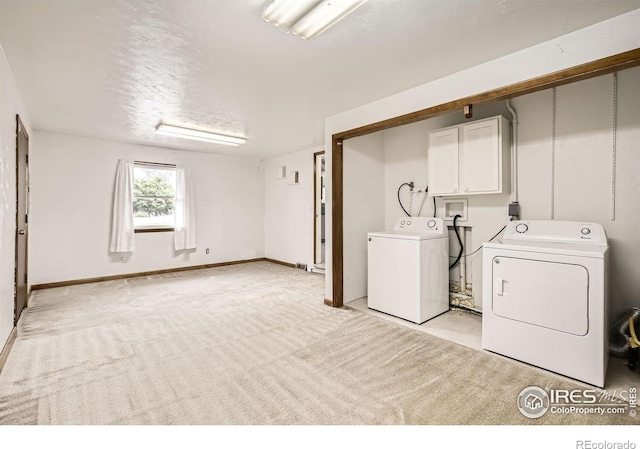 4331 Page Pl, Loveland, CO 80537 - washroom with cabinet space, independent washer and dryer, and light colored carpet