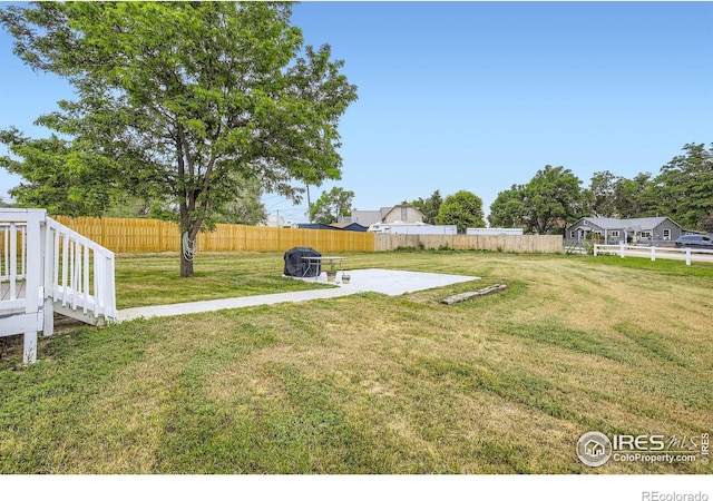 4331 Page Pl, Loveland, CO 80537 - fenced backyard with a patio