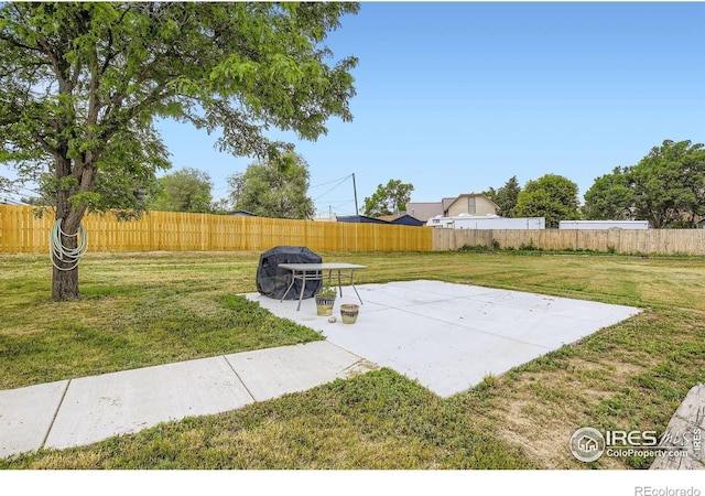4331 Page Pl, Loveland, CO 80537 - fenced backyard featuring a patio
