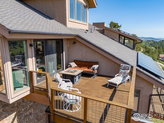 6183 Red Hill Rd, Boulder, CO 80302 - wooden terrace with an outdoor fire pit and a mountain view