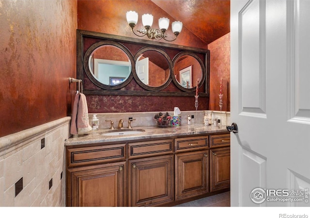 6183 Red Hill Rd, Boulder, CO 80302 - bathroom with double vanity and lofted ceiling