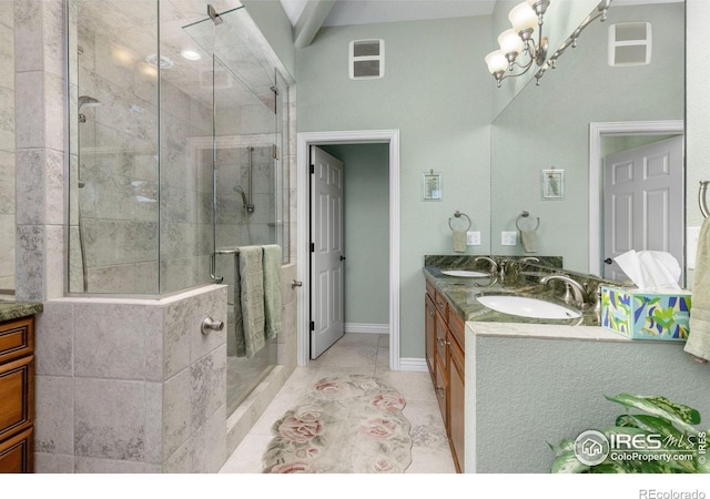 6183 Red Hill Rd, Boulder, CO 80302 - bathroom with double vanity, a stall shower, a chandelier, and tile patterned flooring