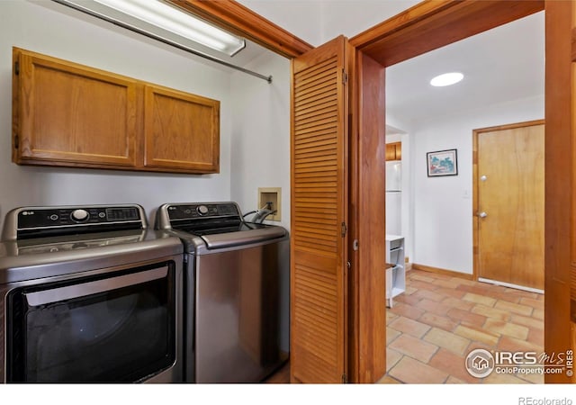 2306 Ptelea Ct, Loveland, CO 80538 - washroom featuring cabinet space and washing machine and clothes dryer