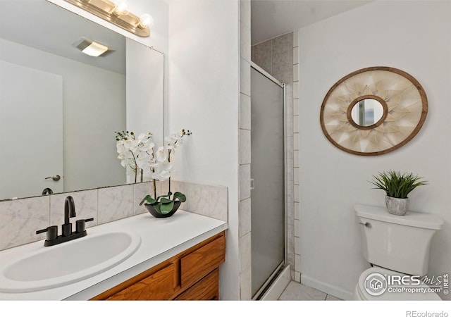 2306 Ptelea Ct, Loveland, CO 80538 - full bathroom featuring a stall shower, vanity, and tile patterned floors