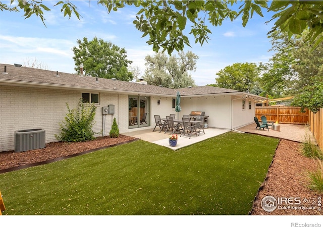 2306 Ptelea Ct, Loveland, CO 80538 - back of house featuring a patio and brick siding