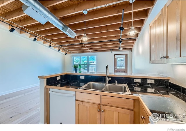 1941 Pearl St Unit 303, Boulder, CO 80302 - kitchen with dishwasher, light brown cabinets, wood finished floors, a peninsula, and rail lighting