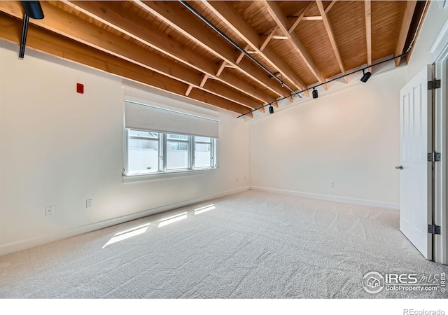 1941 Pearl St Unit 303, Boulder, CO 80302 - carpeted empty room featuring baseboards