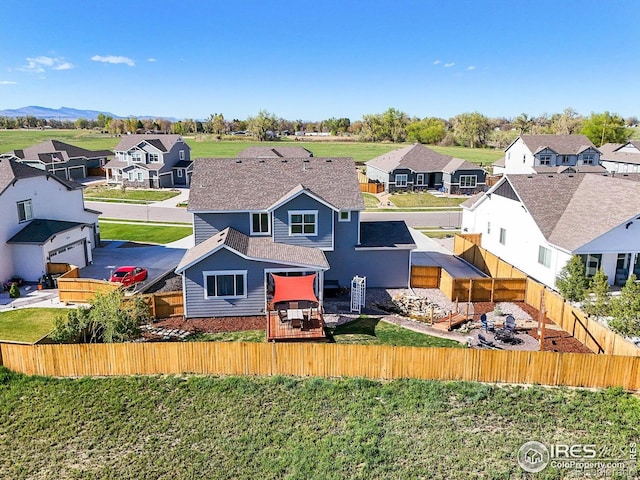 437 Buckskin Rd, Berthoud, CO 80513 - rear view of property featuring a residential view, a fenced backyard, and roof with shingles