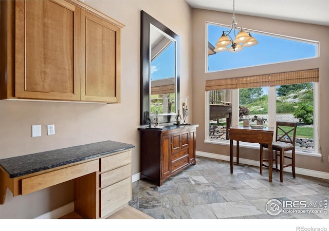 4926 Saint Andrews Ct, Loveland, CO 80537 - kitchen featuring a chandelier, plenty of natural light, and hanging light fixtures