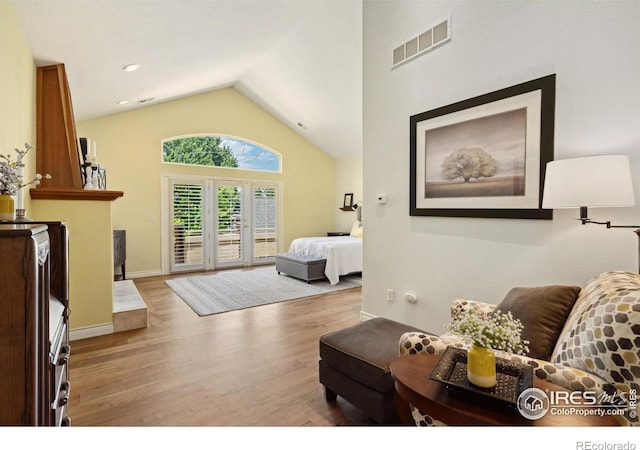 4926 Saint Andrews Ct, Loveland, CO 80537 - living room with wood finished floors and high vaulted ceiling