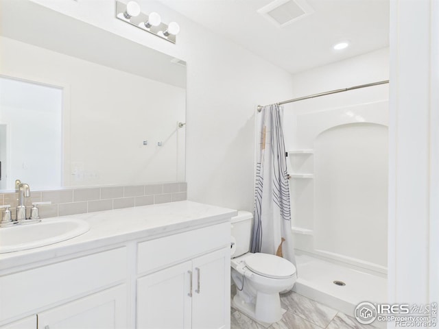 3840 Katmai Ave, Evans, CO 80620 - full bathroom with vanity, a shower with curtain, and decorative backsplash