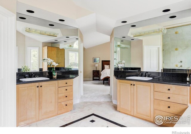 3421 4th St, Boulder, CO 80304 - full bath featuring lofted ceiling, two vanities, connected bathroom, and a stall shower