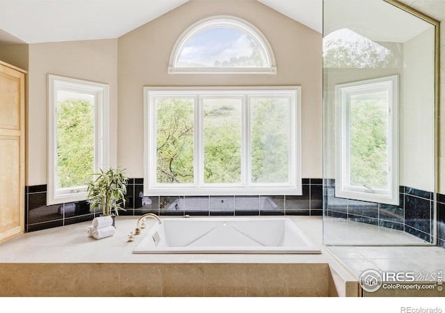 3421 4th St, Boulder, CO 80304 - full bathroom featuring a bath, lofted ceiling, and plenty of natural light